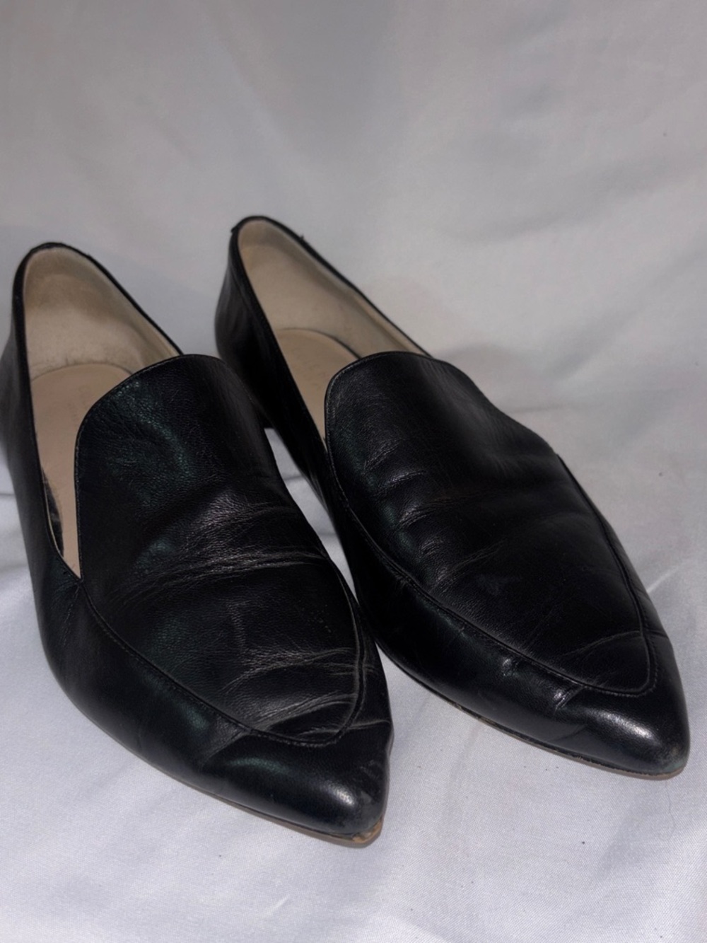 Cole Haan black leather pointed-toe loafers